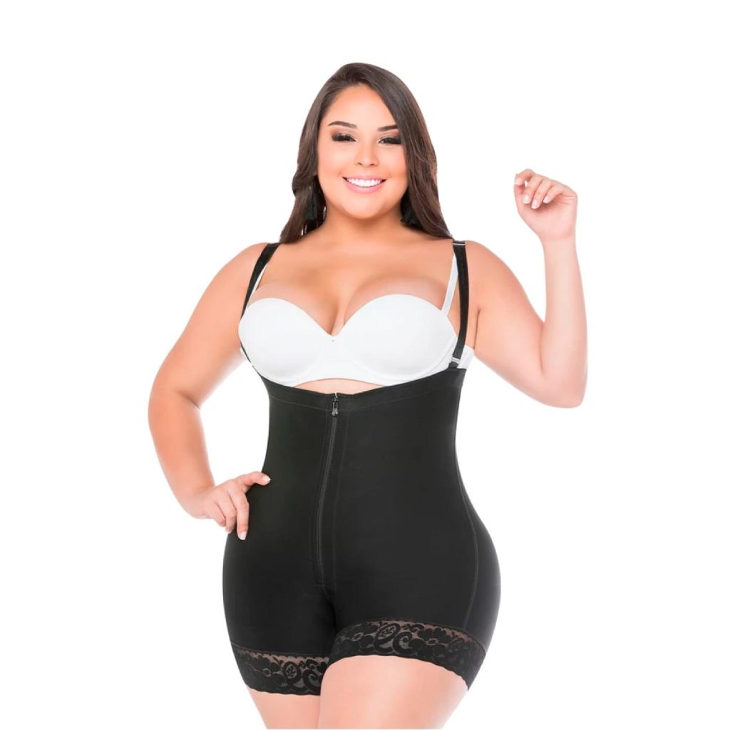 Woman modelling a black open-bust compression bodysuit with adjustable straps and front zip closure.