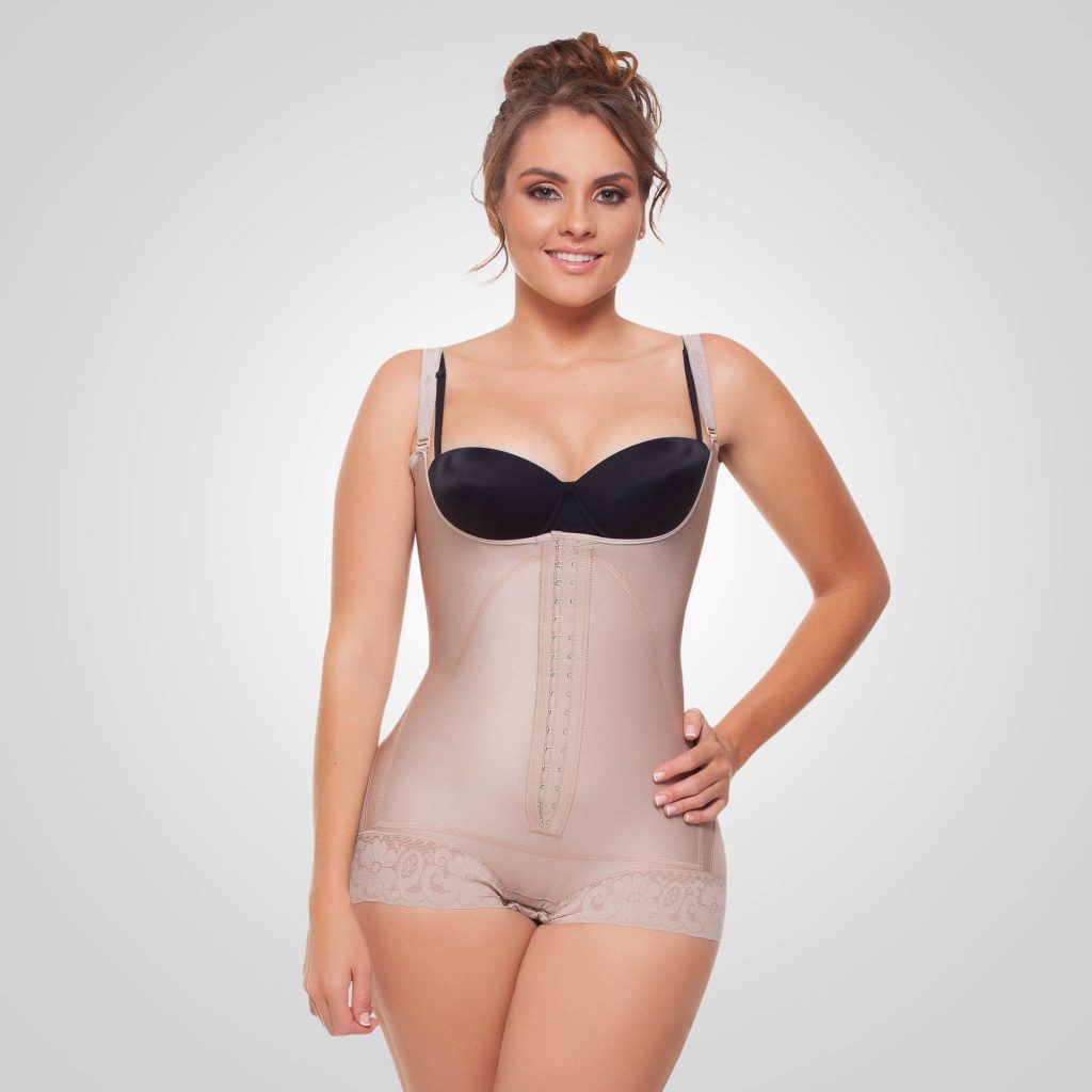 Woman wearing a beige Juliette Fajitex panty shaper with front hook-and-eye closure and adjustable shoulder straps.